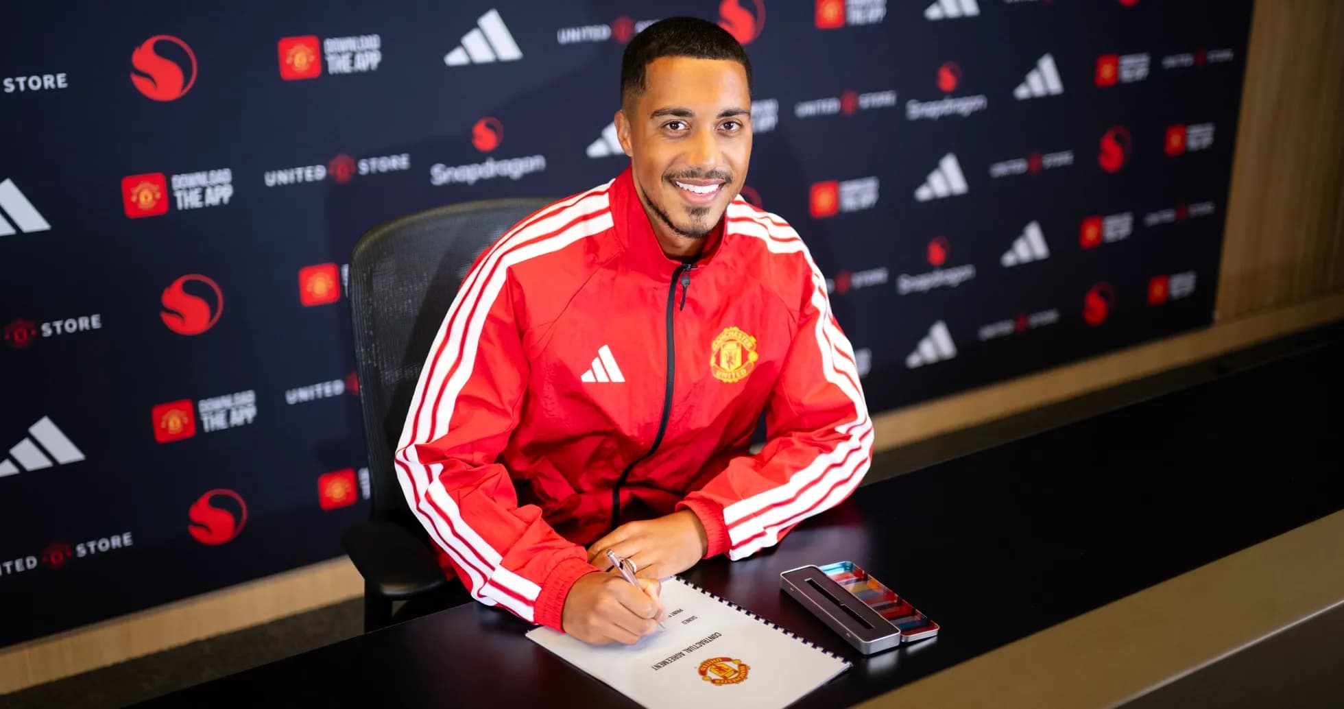 Player signing contract at Manchester United announcement Player signing contract at Manchester United announcement