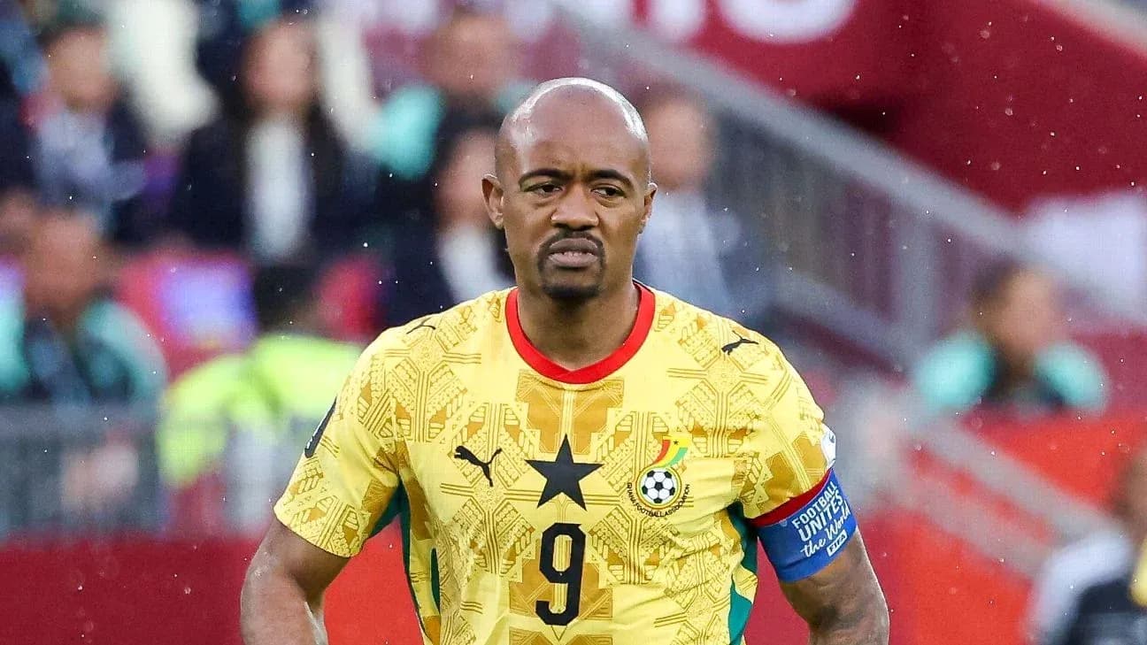 Ghana player in yellow jersey during match Ghana player in yellow jersey during match
