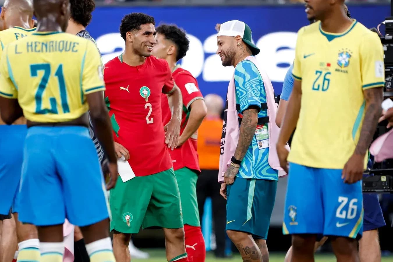 Players from Morocco and Brazil chatting post-match Players from Morocco and Brazil chatting post-match