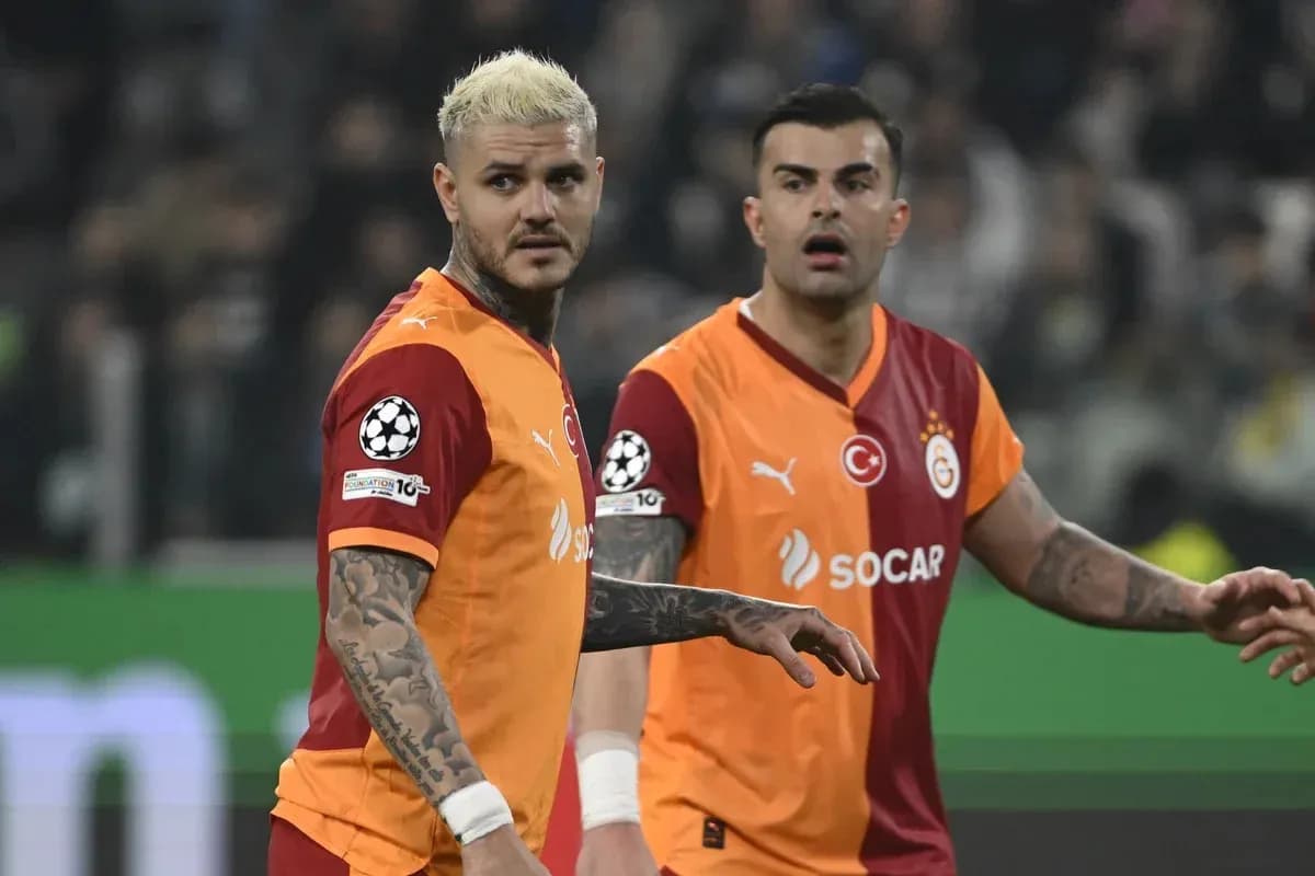 Two Galatasaray players in UEFA match action Two Galatasaray players in UEFA match action