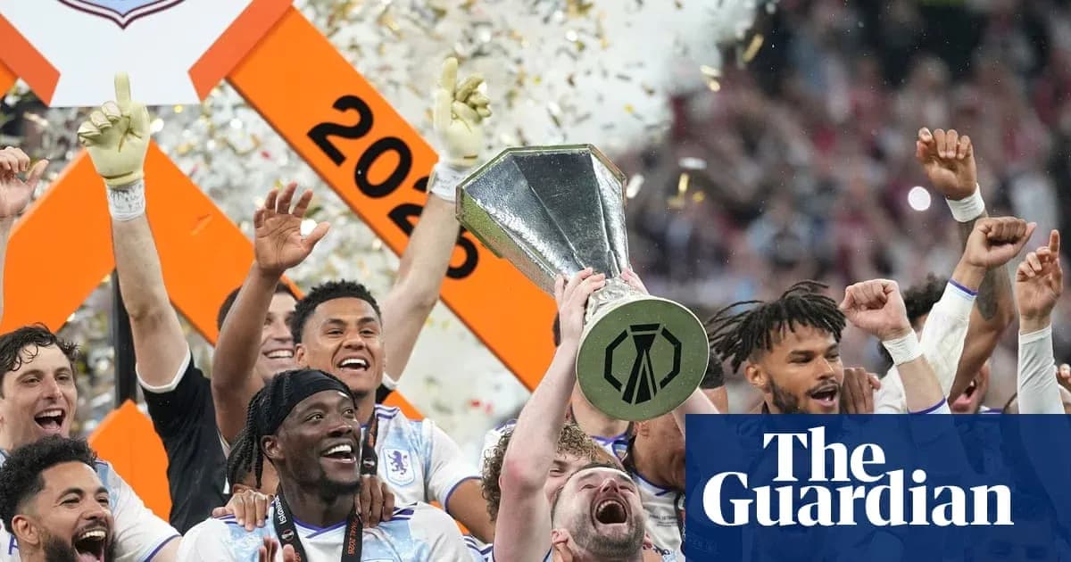 Players celebrating with trophy after winning championship Players celebrating with trophy after winning championship