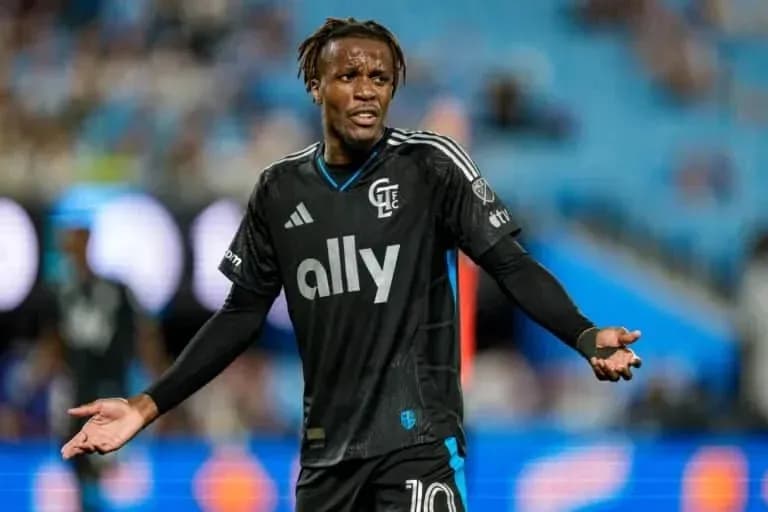 Player gesturing during a soccer match Player gesturing during a soccer match