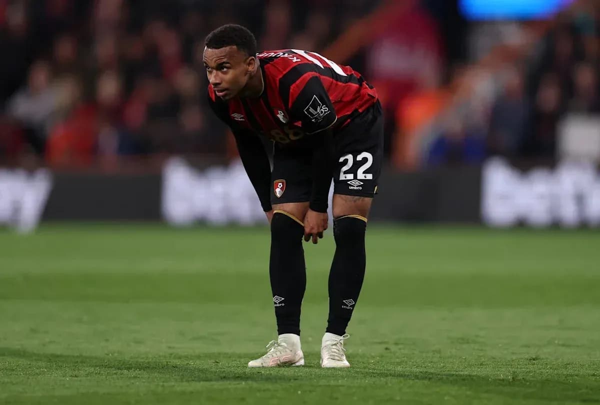 Bournemouth player bending over on the field Bournemouth player bending over on the field