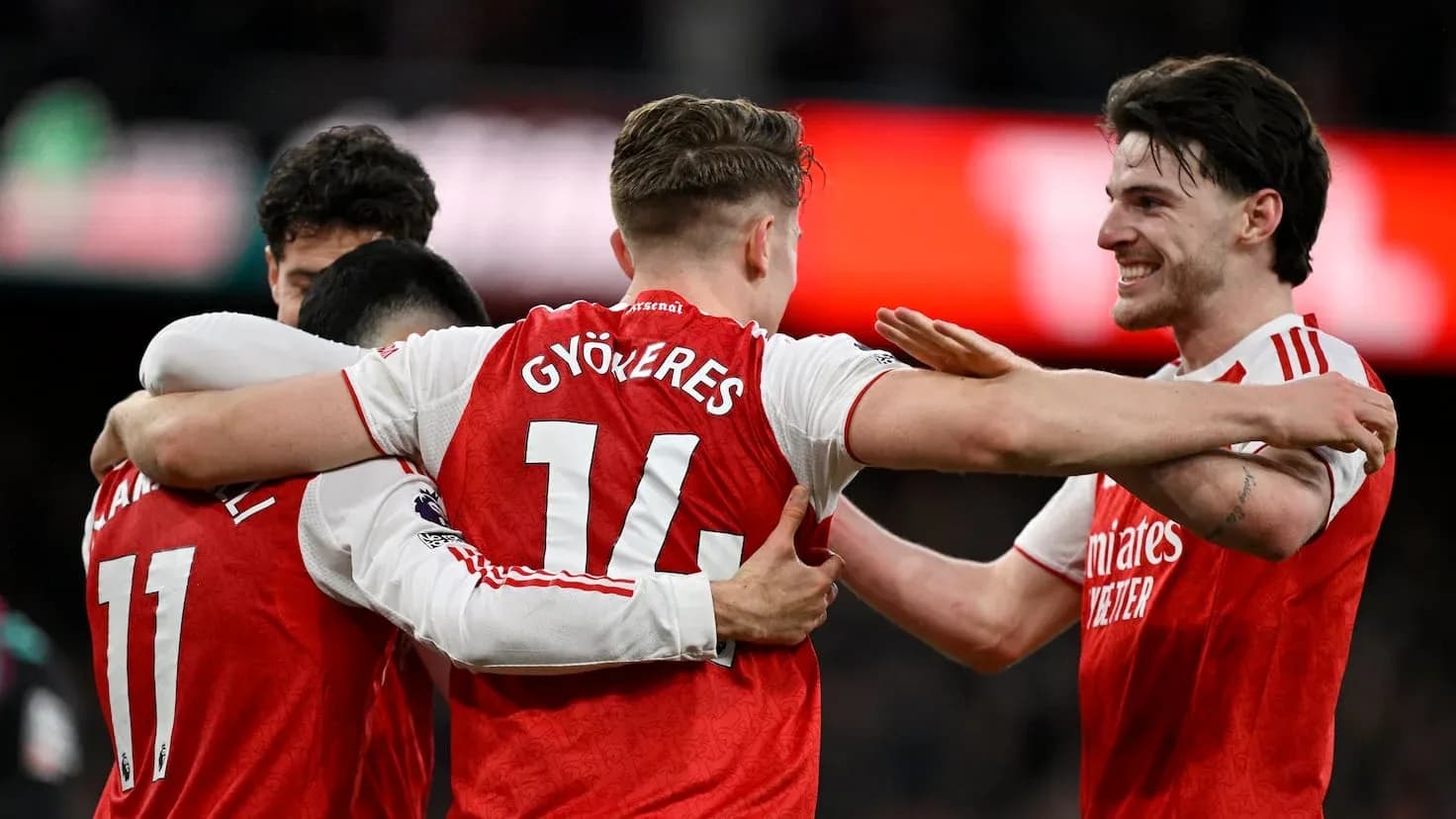 Arsenal players celebrating a goal Arsenal players celebrating a goal