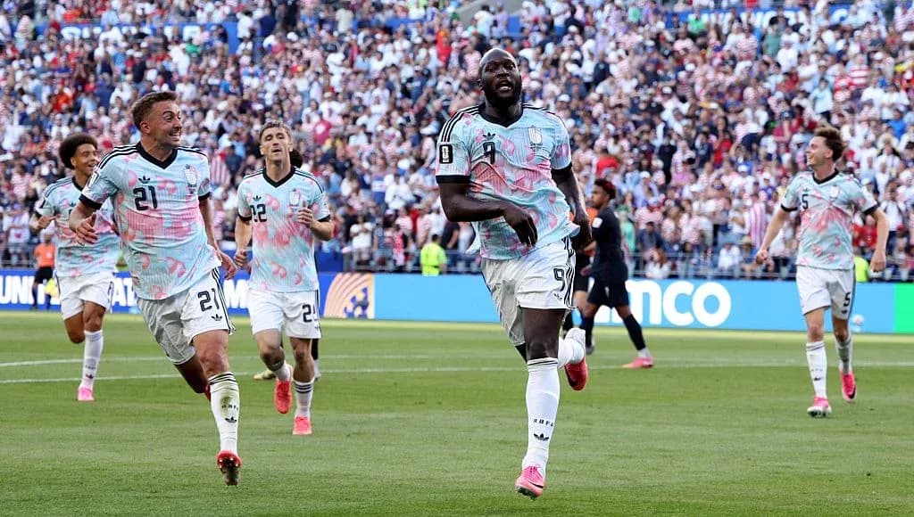 Players celebrating after scoring a goal during match Players celebrating after scoring a goal during match
