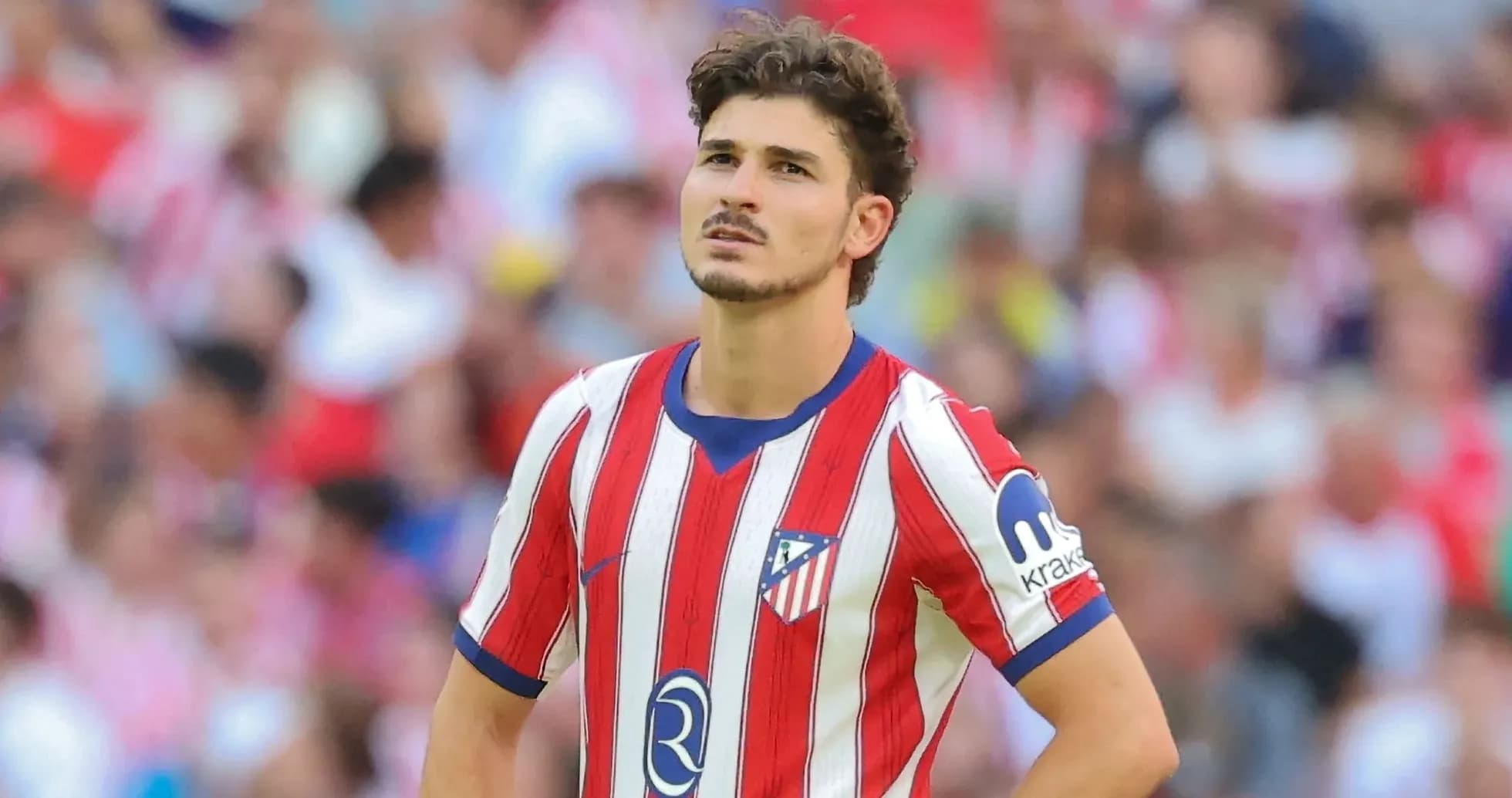 Player in Atlético Madrid jersey during match Player in Atlético Madrid jersey during match