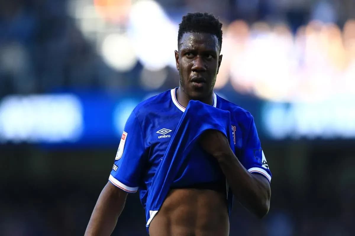 Player removing shirt during match on field Player removing shirt during match on field