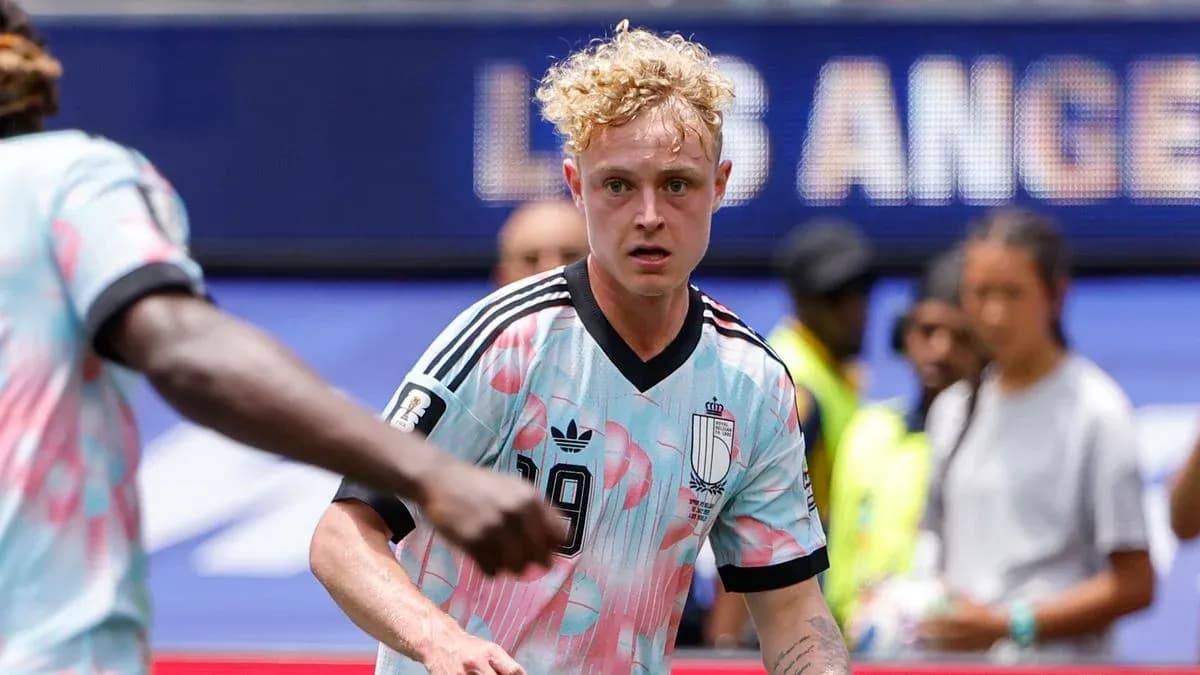 Player in colorful jersey during soccer match Player in colorful jersey during soccer match