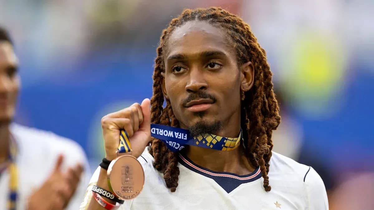 Player holding bronze medal after FIFA World Cup Player holding bronze medal after FIFA World Cup