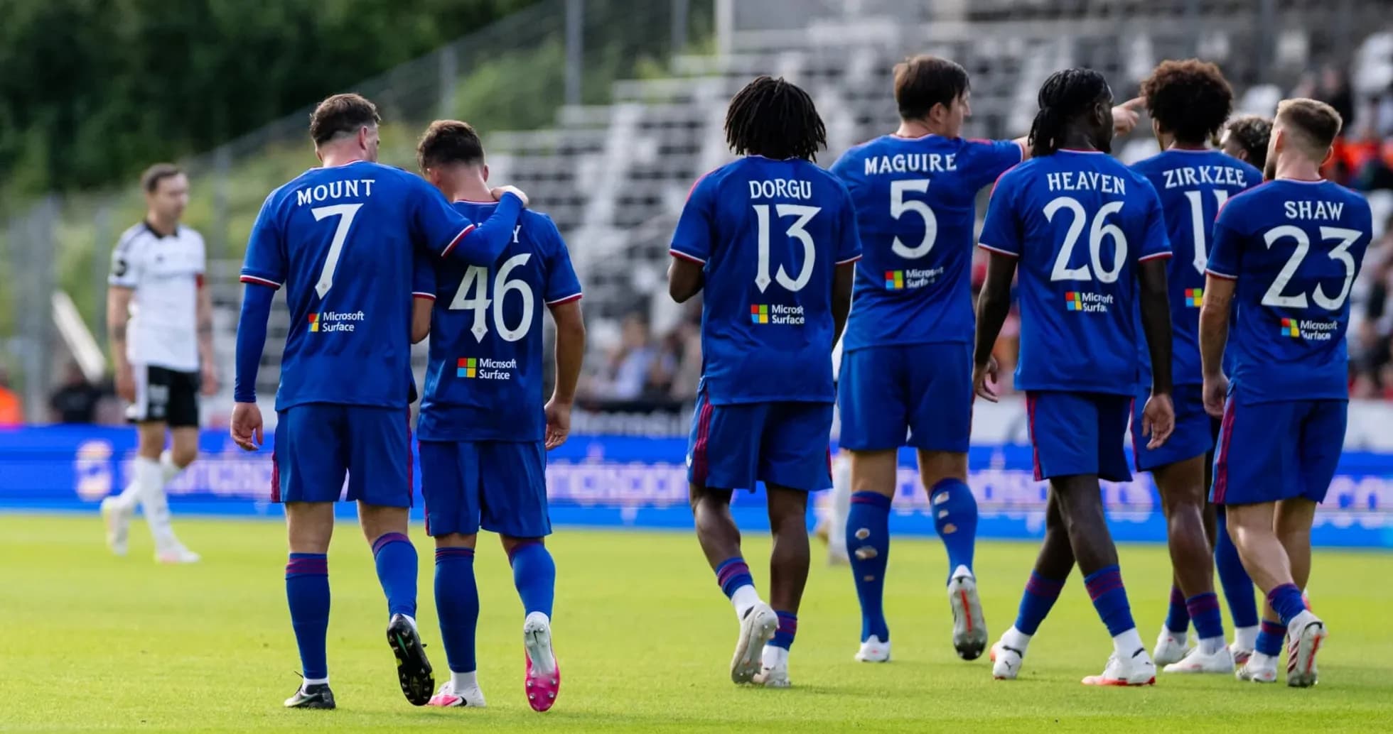 Team celebrating a goal during a match Team celebrating a goal during a match