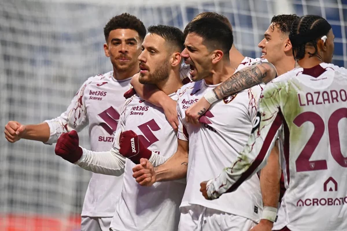 Torino players celebrating a goal during match Torino players celebrating a goal during match