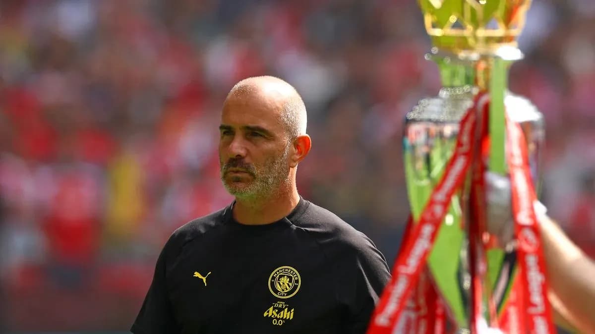 Manager observing trophy presentation during match Manager observing trophy presentation during match