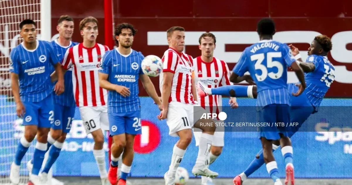Players from Brighton and Brentford in action during match Players from Brighton and Brentford in action during match