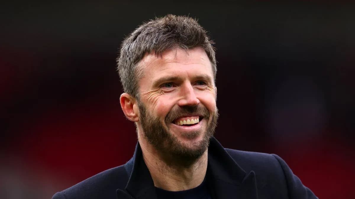 Man smiling during a sports event Man smiling during a sports event