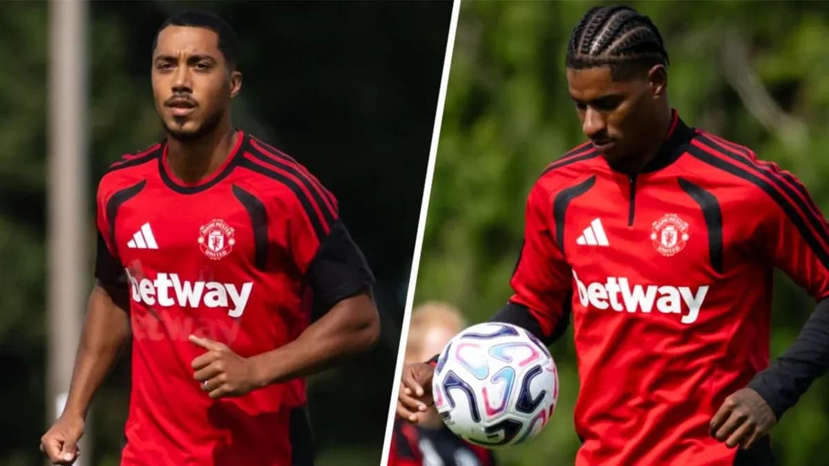 Two Manchester United players in training kits Two Manchester United players in training kits