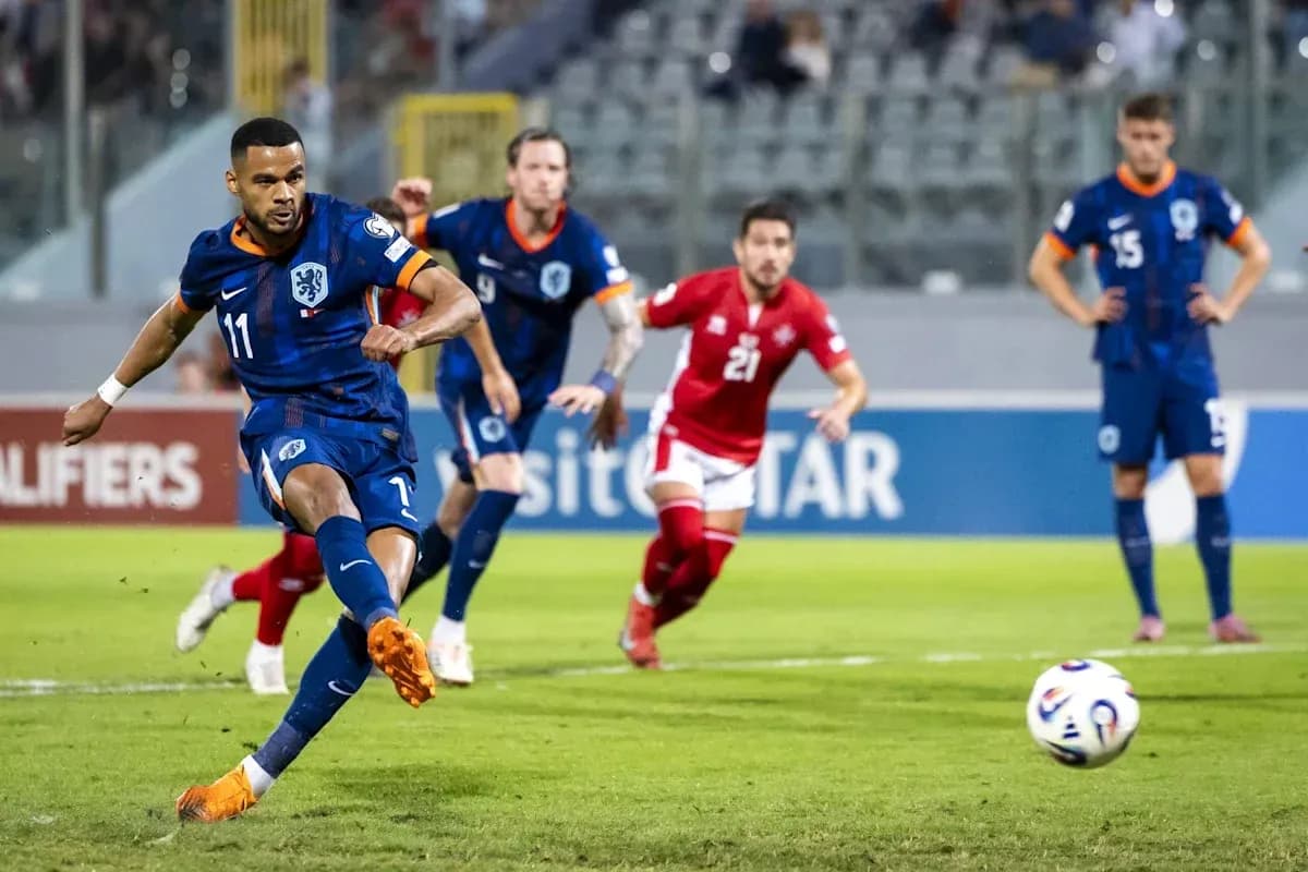 Player taking a penalty kick during match Player taking a penalty kick during match