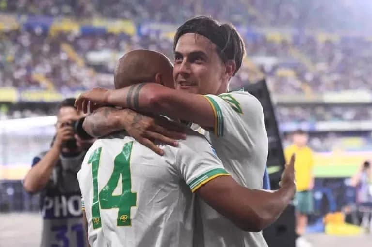 Two players embracing after a match celebration Two players embracing after a match celebration