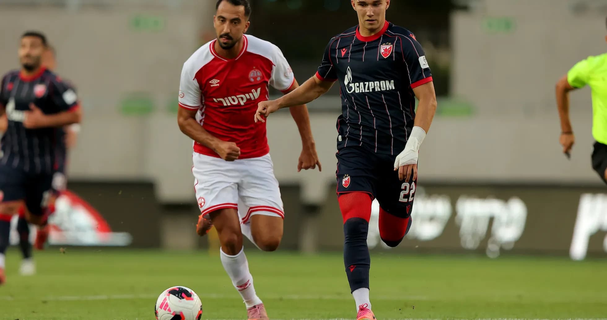 Players from FK Crvena Zvezda and Hapoel Beer Sheva competing Players from FK Crvena Zvezda and Hapoel Beer Sheva competing