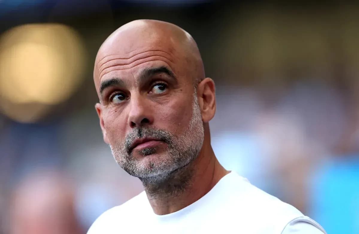 Manager observing from the sidelines during match Manager observing from the sidelines during match