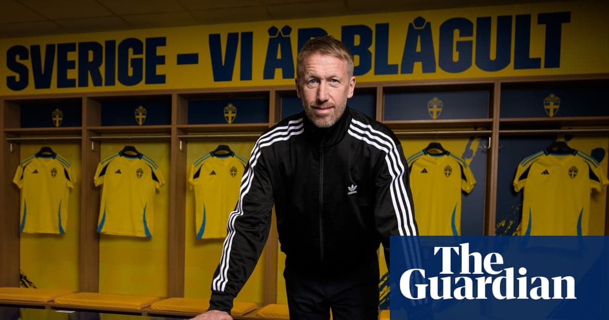 Coach standing in locker room with Swedish jerseys Coach standing in locker room with Swedish jerseys