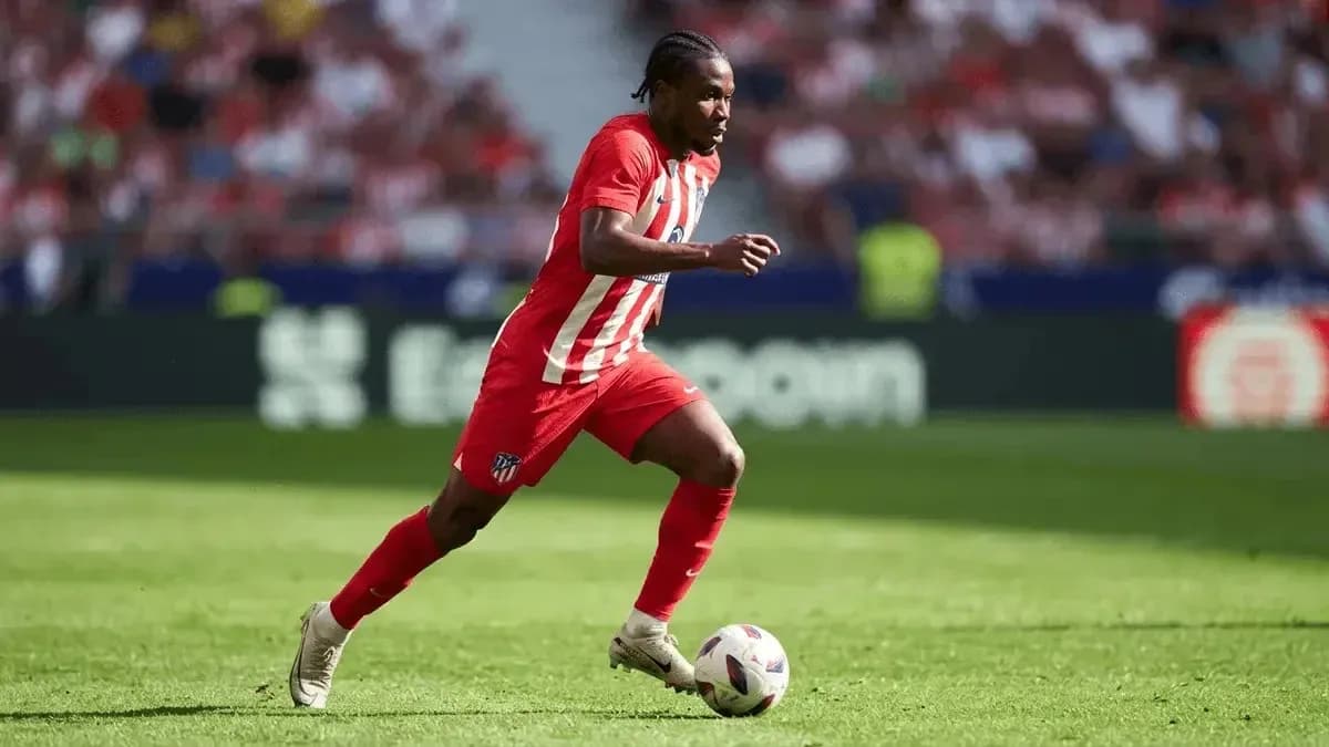 Player running with ball during a match Player running with ball during a match