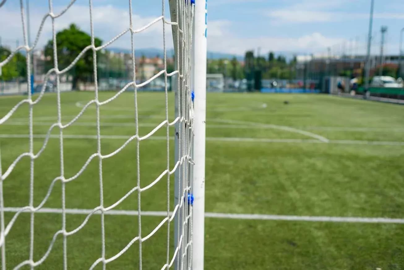 Close-up of soccer goal on training pitch Close-up of soccer goal on training pitch