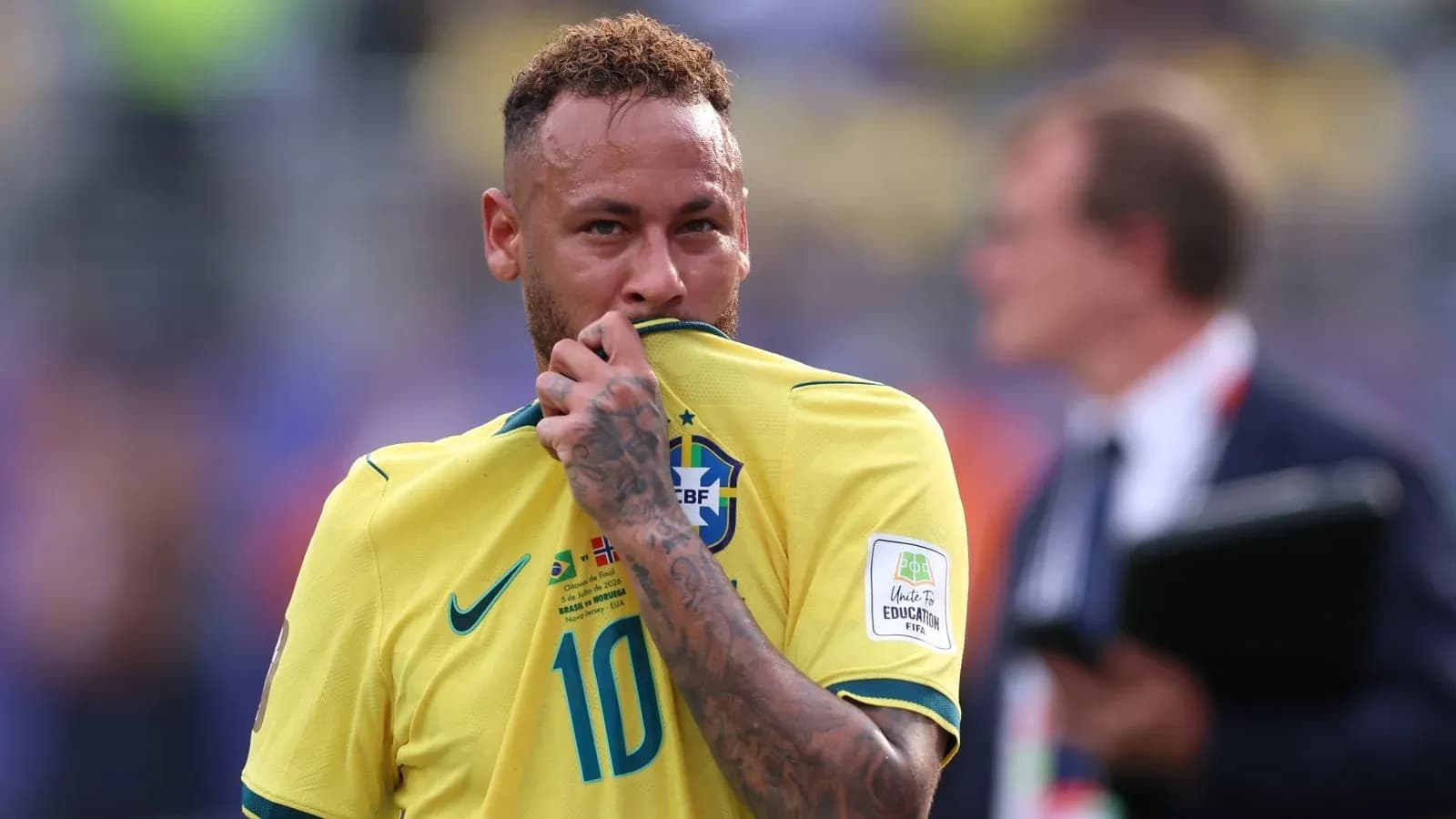 Neymar holding his jersey during match Neymar holding his jersey during match