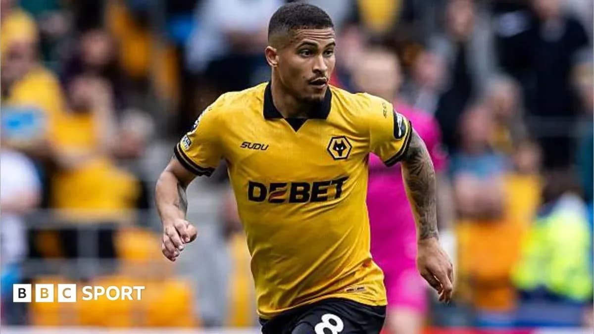 Player running during a match for Wolverhampton Wanderers Player running during a match for Wolverhampton Wanderers