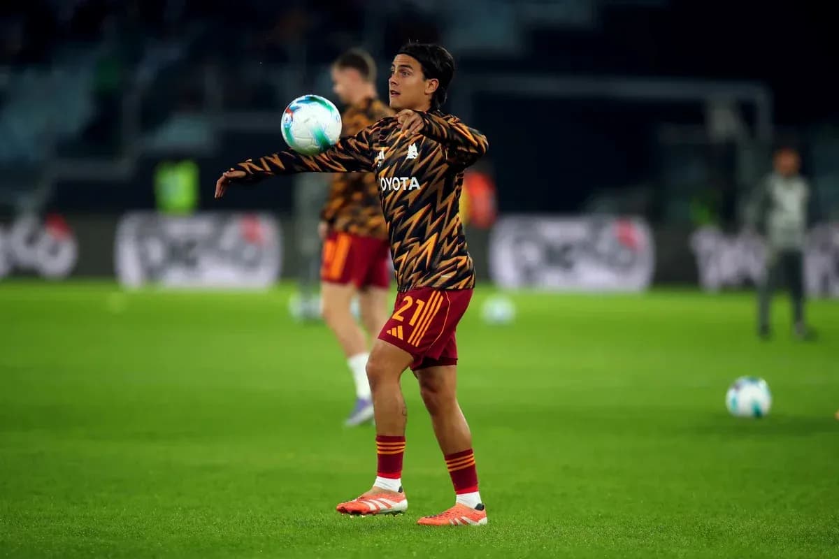 Player warming up with ball during training session Player warming up with ball during training session