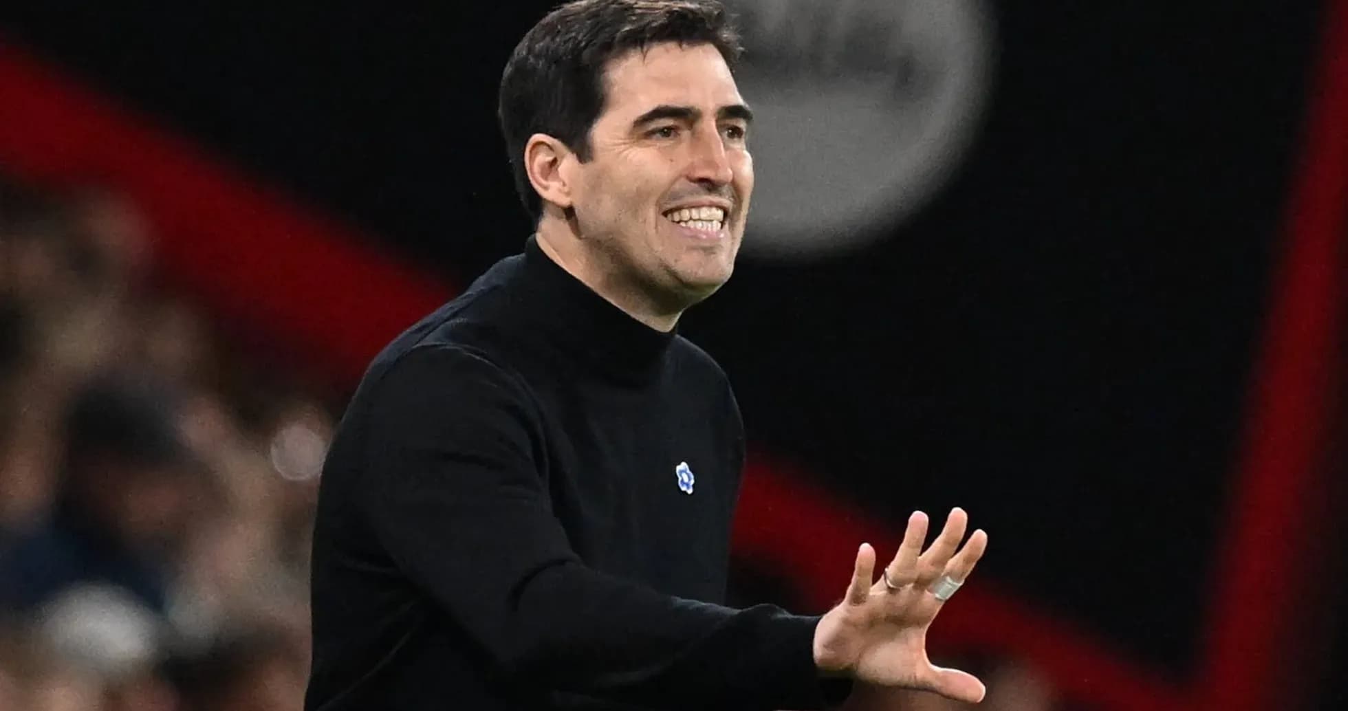 Coach gesturing during a match from the sidelines Coach gesturing during a match from the sidelines