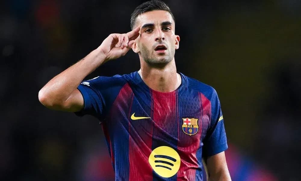 Player saluting during match wearing FC Barcelona jersey Player saluting during match wearing FC Barcelona jersey