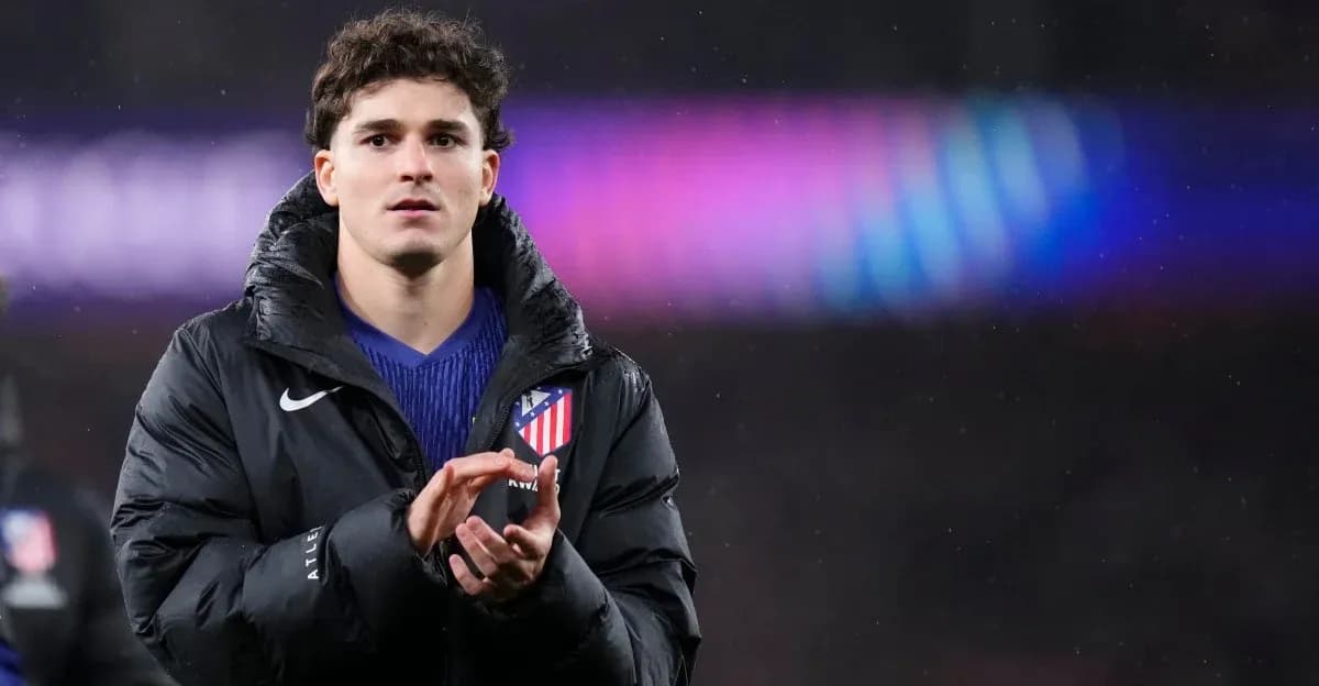 Player applauding while wearing Atletico Madrid jacket Player applauding while wearing Atletico Madrid jacket