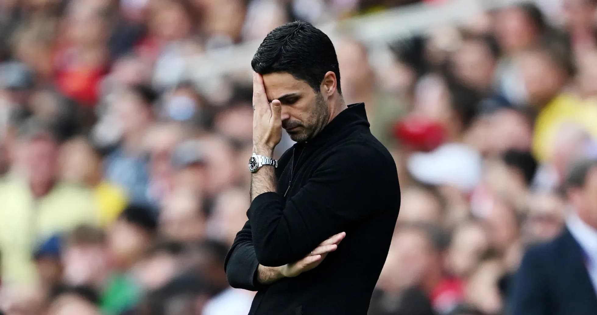 Coach with hand on face during match Coach with hand on face during match