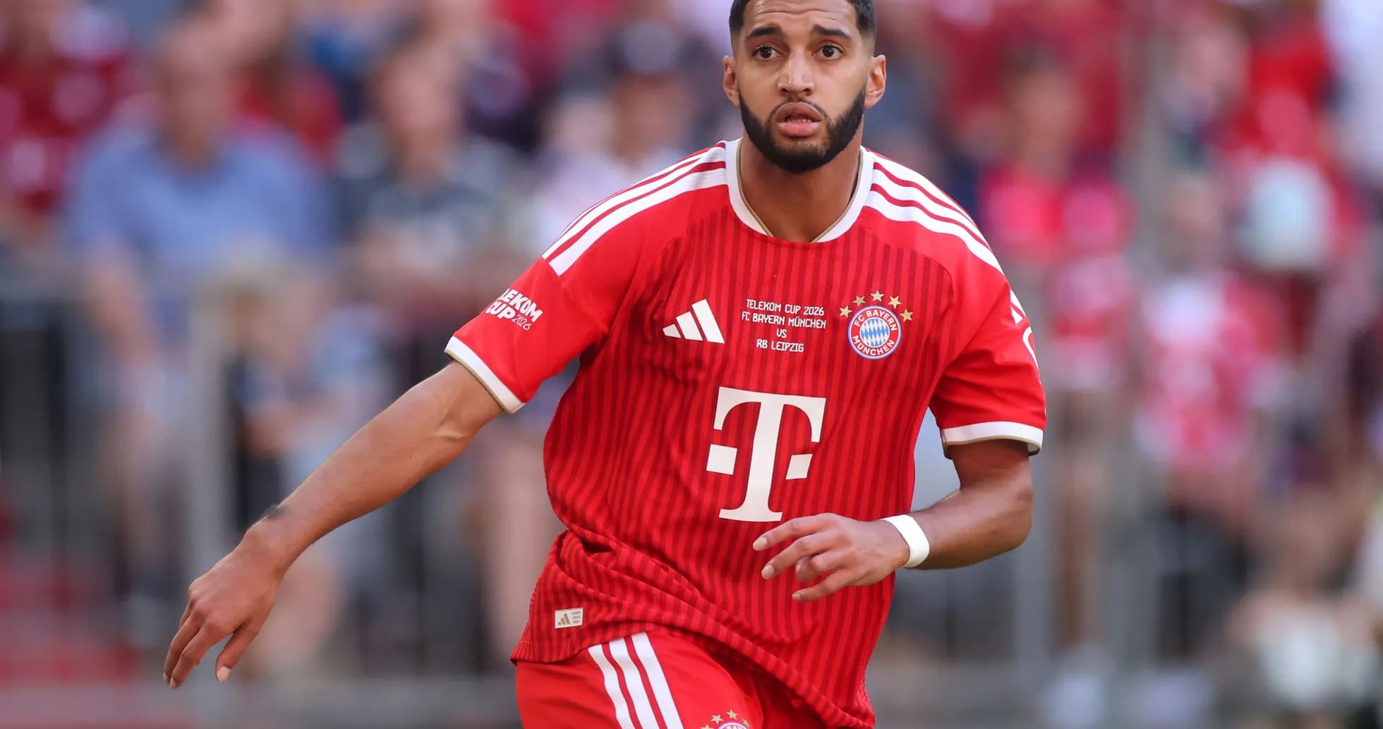 Player in red Bayern Munich kit during match Player in red Bayern Munich kit during match