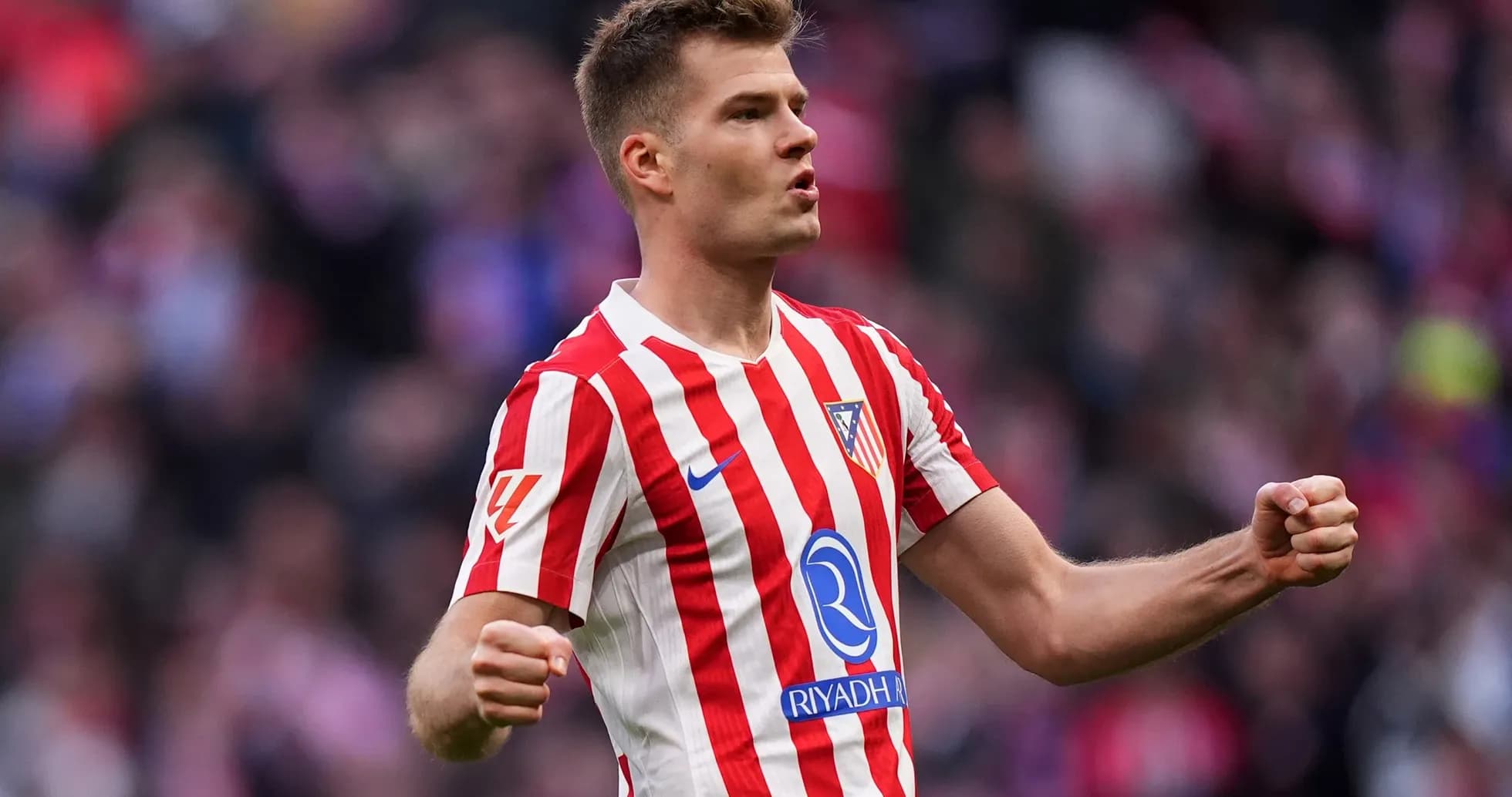 Atletico Madrid player celebrating a goal Atletico Madrid player celebrating a goal