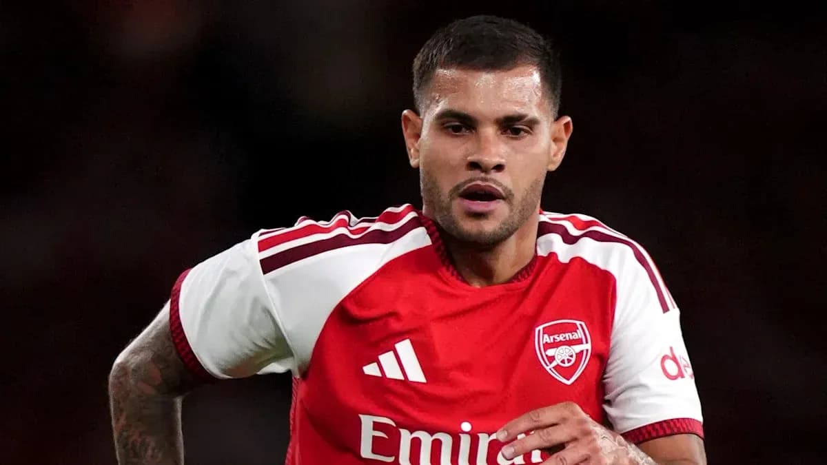 Player running in Arsenal jersey during match Player running in Arsenal jersey during match