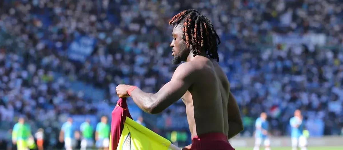 Player removing jersey on the field during match Player removing jersey on the field during match