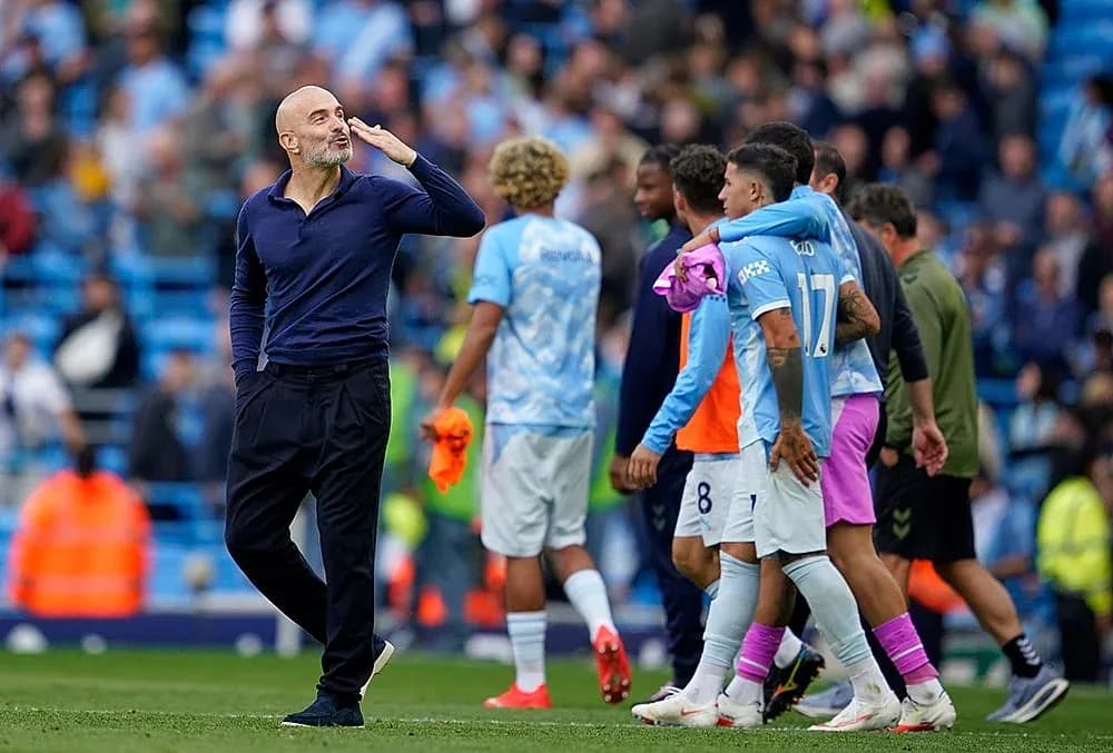 Manchester City players celebrating after match Manchester City players celebrating after match
