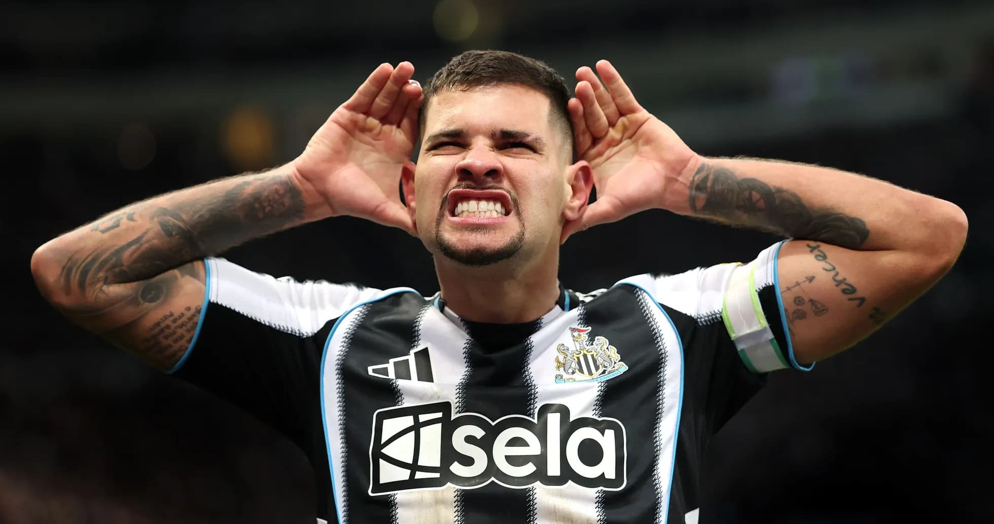 Player celebrating and signaling to the crowd Player celebrating and signaling to the crowd