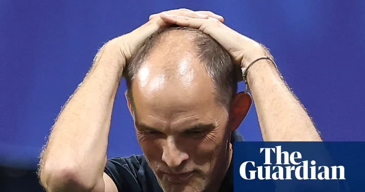 Coach holding head in frustration during match Coach holding head in frustration during match