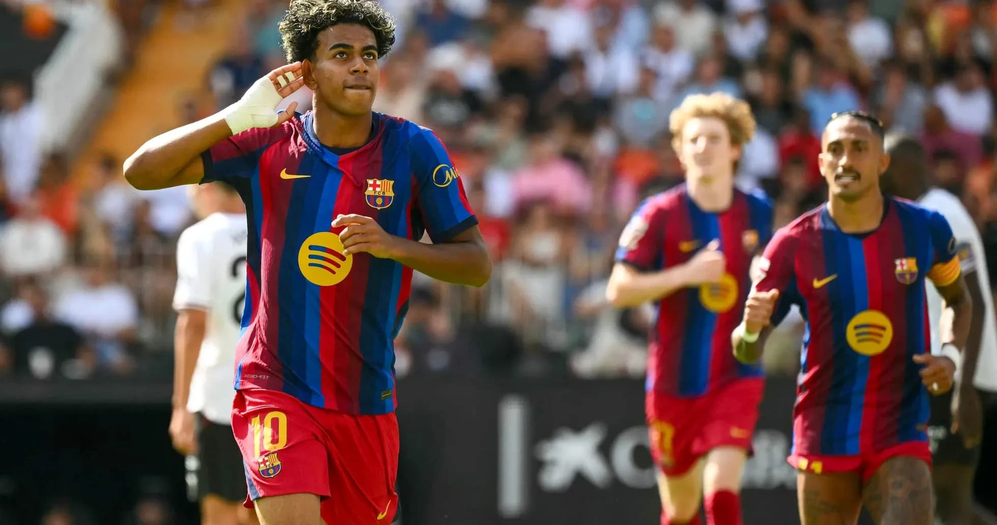 Barcelona player celebrating goal against Valencia Barcelona player celebrating goal against Valencia