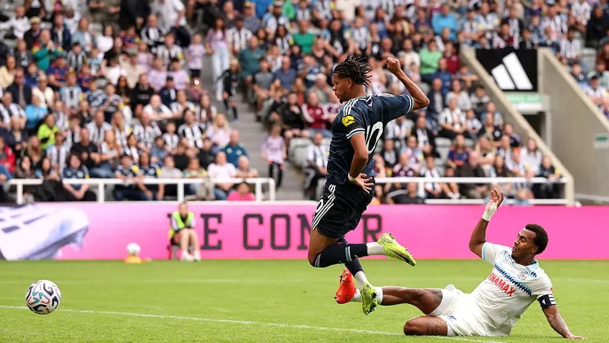 Player jumping over opponent during a soccer match Player jumping over opponent during a soccer match