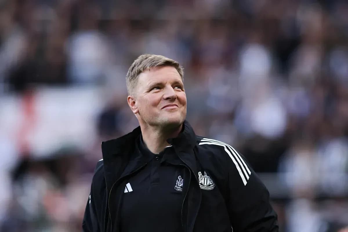 Newcastle United manager smiling on the sidelines Newcastle United manager smiling on the sidelines