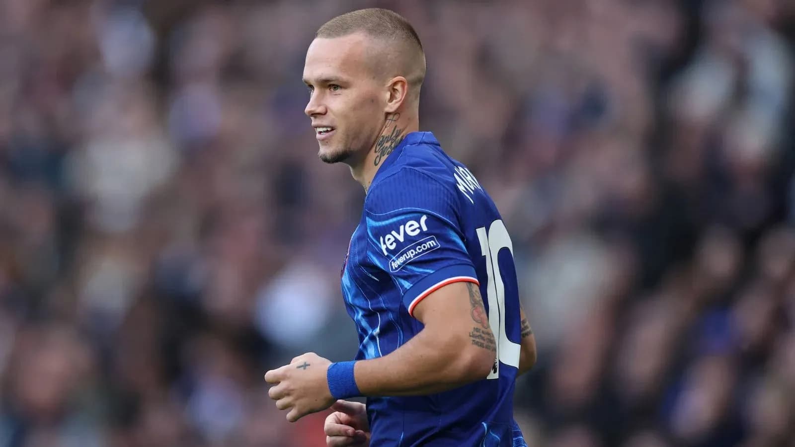 Player in blue jersey during a match Player in blue jersey during a match