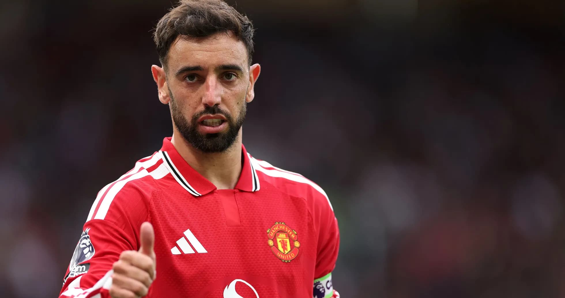 Bruno Fernandes giving a thumbs up during match Bruno Fernandes giving a thumbs up during match