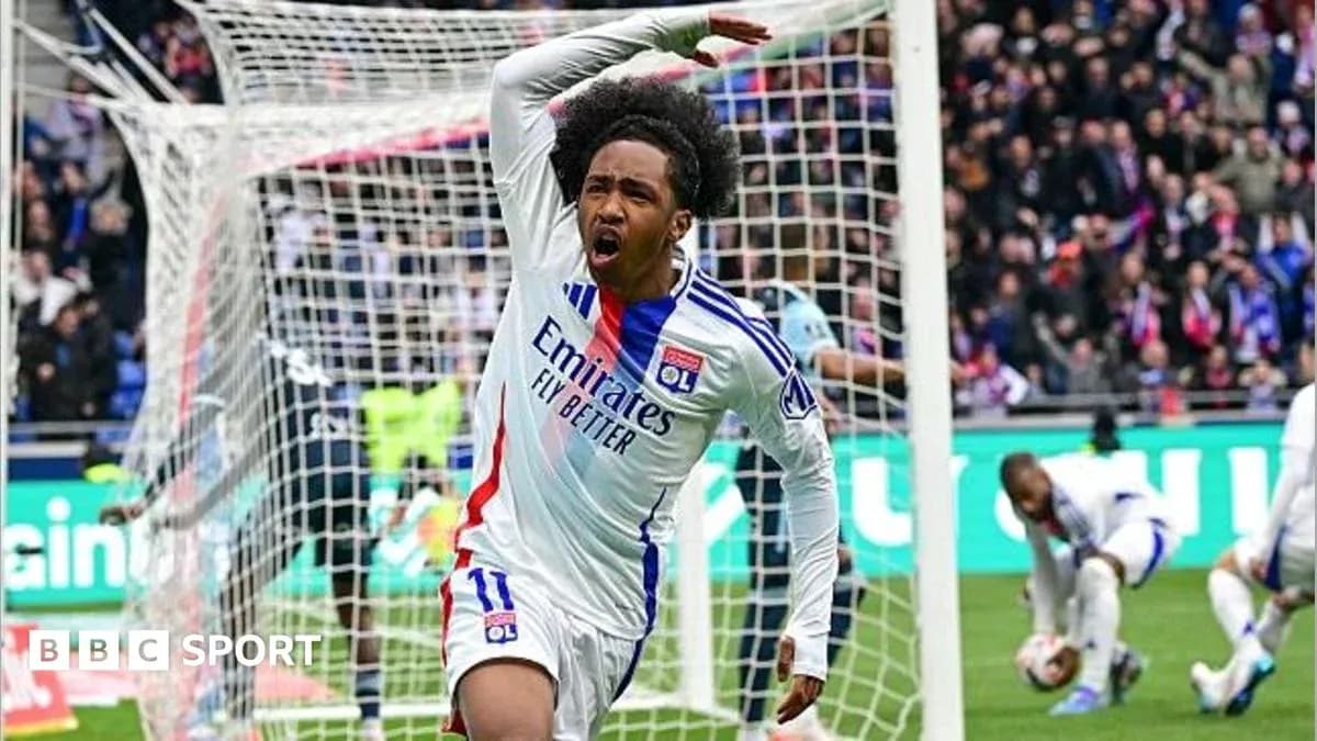 Player celebrating a goal in front of the net Player celebrating a goal in front of the net