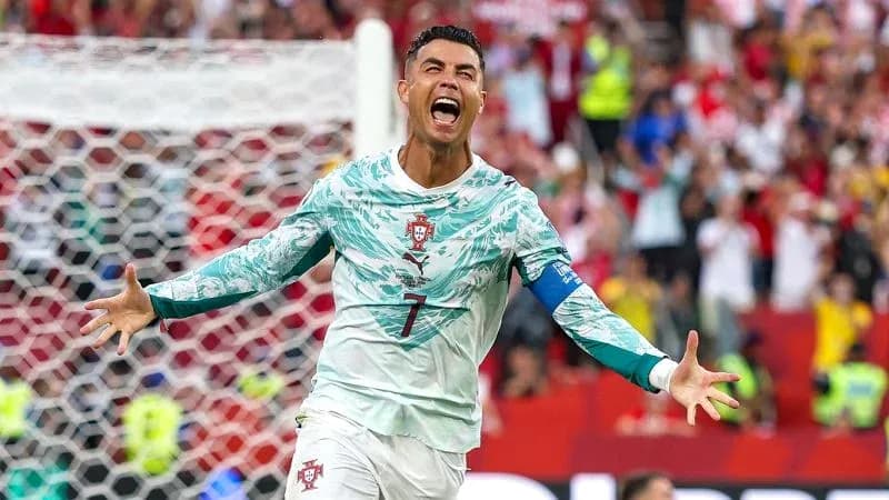 Cristiano Ronaldo celebrating after scoring a goal Cristiano Ronaldo celebrating after scoring a goal