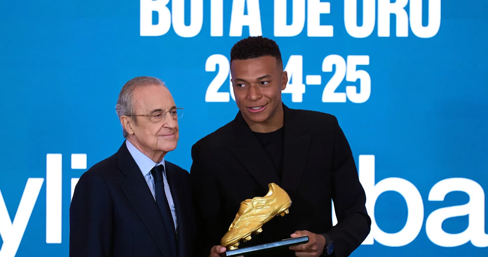 Kylian Mbappé receiving Golden Boot award from official Kylian Mbappé receiving Golden Boot award from official