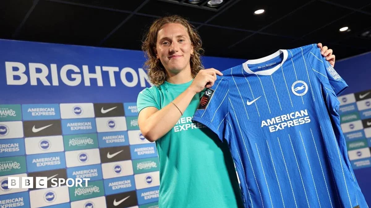 Player presenting Brighton jersey at press conference Player presenting Brighton jersey at press conference