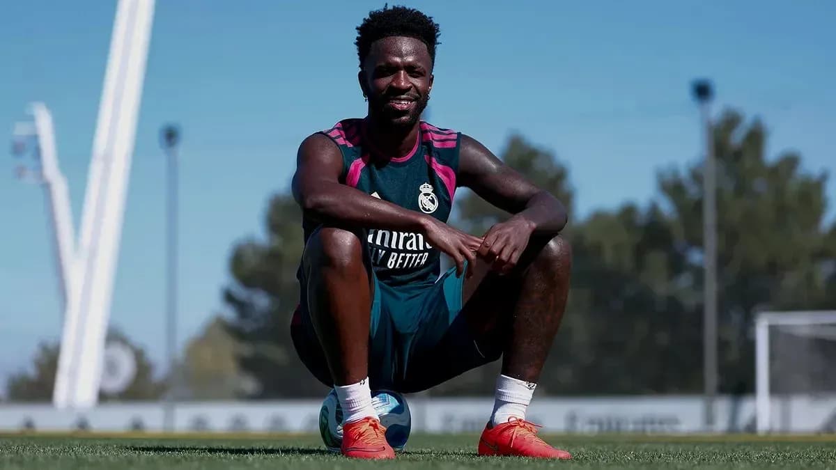 Player sitting on ball during training session Player sitting on ball during training session